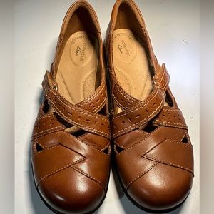 Clarks size 9 slip on leather shoes.